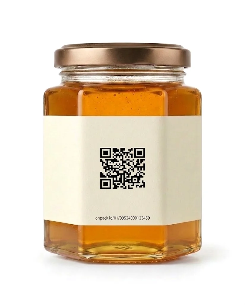 The back of a honey jar — a QR code and short URL printed on the label